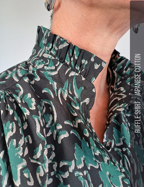 Modern stylish sewing pattern for womans shirt with ruffle collar
