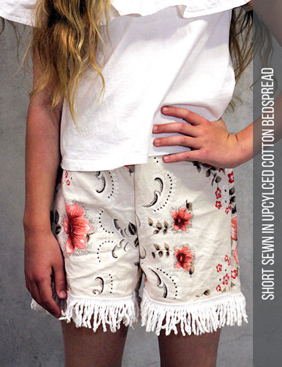 Upcycled children shorts from bed cover